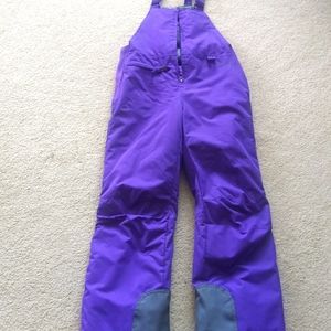 Girls size Large purple insulated snow bibs.